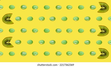 Creative Mosaic Made Of Kiwi Fruits Eating Green Easter Eggs Against Yellow Background. Original Lemon Decoration. Fruit Concept. Minimal Summer Design. Creative Easter Idea.