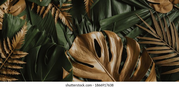 Creative Nature Background. Gold And Green Tropical Monstera And Palm Leaves. Minimal Summer Abstract Jungle Or Forest Pattern.