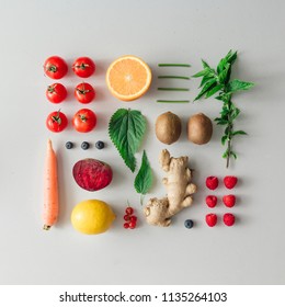 Creative Neatly Arranged Food Layout With Fruits, Vegetables And Leaves On Bright Background. Minimal Healthy Food Concept. Flat Lay.