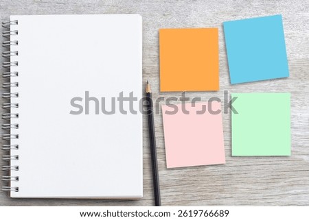 Creative office desk concepts featuring notepad and sticky notes for organized workspaces