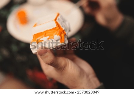 A Creative Painting of a Toy Truck is Currently in Progress and Getting Detailed Touches