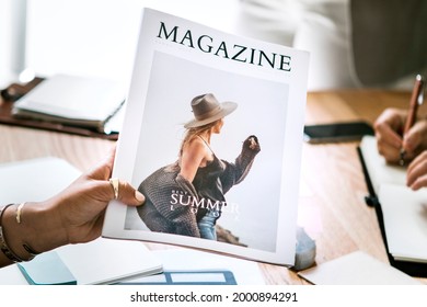 Creative people working on magazine cover design - Shutterstock ID 2000894291