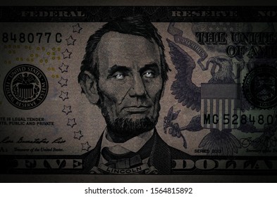 Creative Photo Of Portrait Of Abraham Lincoln On A 5 US Dollars Banknote.