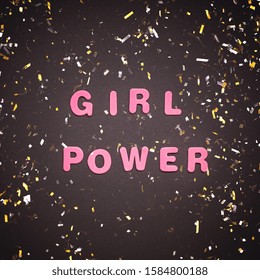 Creative pink text made from letters GIRL POWER writing on black paper background with golden confetti. Women empowerment concept, template for female blog or design - Powered by Shutterstock