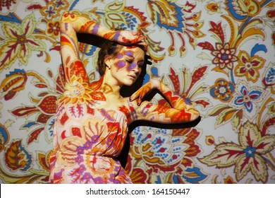 Creative Portrait, Fashion Woman With Color Image On Her Face