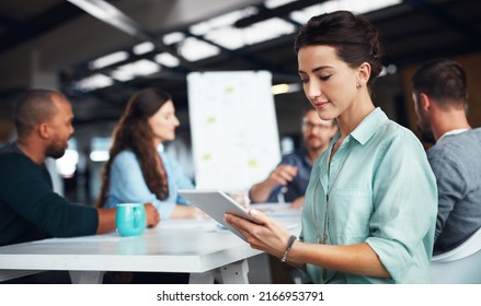 The Creative Process. Shot Of Businesspeople Having A Meeting In A Modern Office.