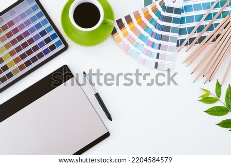creative professional graphic design desk, top view of table graphic designer
