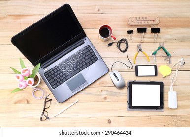 Creative Professional's Work Table And Tech Gadgets From Above