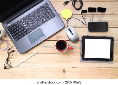 Creative professional's work table and tech gadgets from above