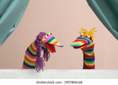 Creative Puppet Show On White Stage Indoors