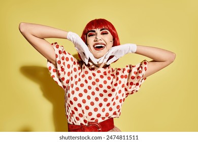 A creative redhead woman wearing a polka dot top and pop art makeup, blending into a comic book world on a yellow background. - Powered by Shutterstock