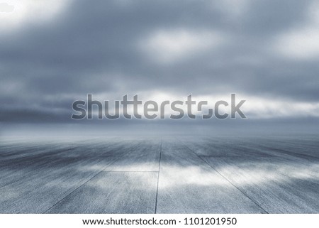 Creative road on dull sky backdrop. Way to success concept 