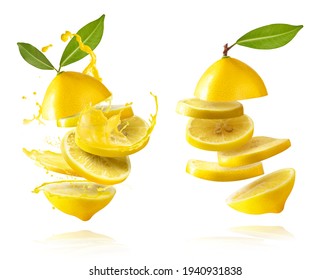 A creative set with Fresh raw lemons with green leaves falling in the air isolated on white background. Food levitation or zero gravity conception. High resolution image - Shutterstock ID 1940931838