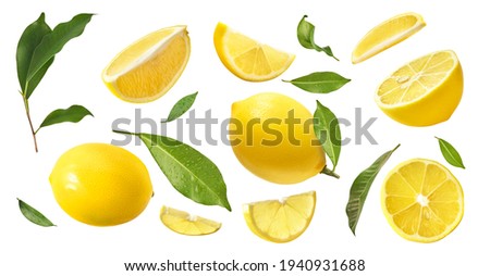 A creative set with Fresh ripe raw lemons with green leaves isolated on white background. Whole and cut yellow lemon collection, high resolution image