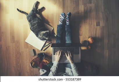 Creative Space - Girl With Her Cat Working From Home.