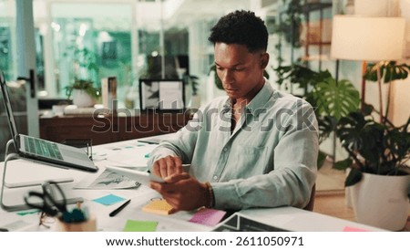 Creative, startup or man on tablet for social media campaign, trends and business ads. Technology, night or content strategist in agency for online review, performance or branding design research