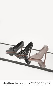 Creative studio shot of various leather pumps with pointed toe, product photography	