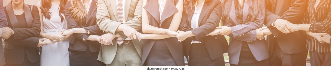 Creative team meeting hands together in line, asian people teamwork acquisition, brainstorm business people concept. Startup friends creative people sale project background panoramic banner - Powered by Shutterstock