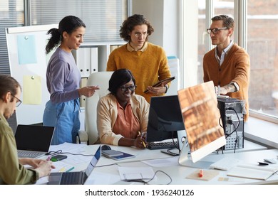 Creative Team of Software Developers Discussing Project