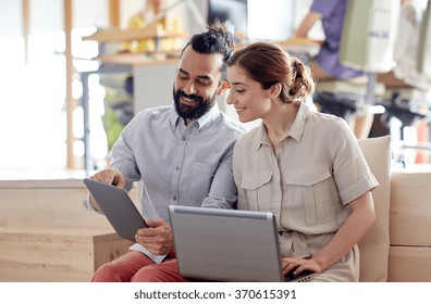 Creative Team With Tablet Pc And Laptop In Office