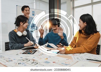 Creative teamwork using high tech headset for virtual reality. Team of ux developer and ui designer brainstorming interface