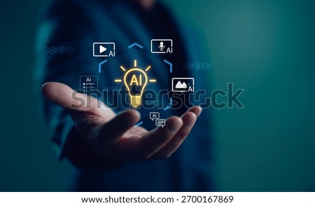Creative technology concept with AI icon in light bulb and multimedia symbols on businessman’s hand. Represents artificial intelligence in content creation, digital innovation, and smart media tools.