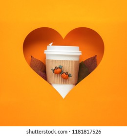 Creative Thanksgiving Day Concept Photo Of Take Away Coffee Cup On Orange Background.