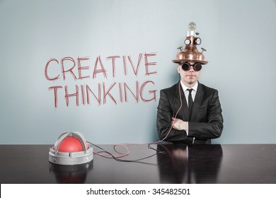 Creative Thinking Concept With Vintage Businessman And Calculator At Office