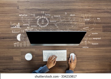 Creative thinking drawing business success strategy plan ideas on wooden table background, Inspiration concept with businessman working on computer, View from above
