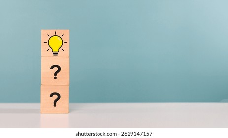Creative, creative thinking ,idea, problem solving, innovation. Wooden cube with light bulb symbol indicates the process of thinking, inspiration, idea