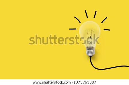 Creative thinking ideas brain innovation concept. Light bulb on yellow background