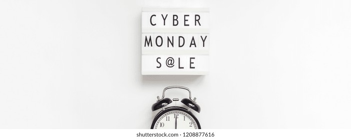 Creative Top view flat lay composition Cyber Monday sale text on lightbox alarm clock white background copy space Template Cyber Monday sale mockup thanksgiving promotion advertising Long wide banner - Powered by Shutterstock - Get 15% off with code: PIKWIZARD15