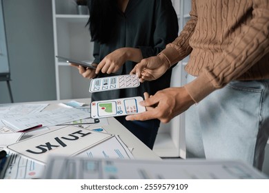 Creative UX UI Design Process with Designers Collaborating on Innovative Digital Interfaces and Wireframes