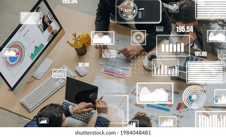 Creative visual of business people in a corporate staff meeting on video call . Concept of digital technology for marketing data analysis and investment decision making . - Powered by Shutterstock