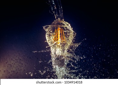 Creative water splash on a Led bulb - light on - Powered by Shutterstock