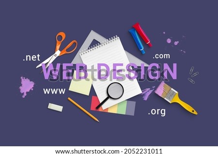 Creative web design concept flat lay composition. Text surrounded with tools on purple surface