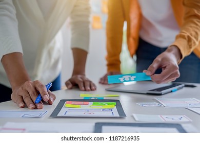 Creative Web Designer planning application and developing template layout, framework for mobile phone. User experience (UX) concept.