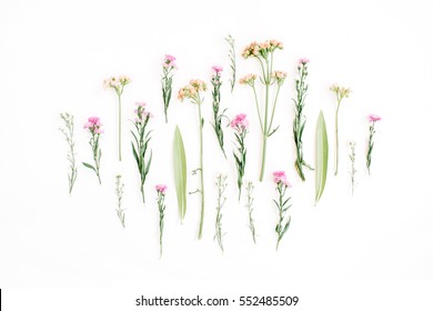 Creative wildflowers arrangement on white background. Flat lay, top view. Valentine's background