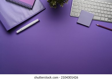 Creative workspace with sticky note, houseplant and supplies. - Powered by Shutterstock