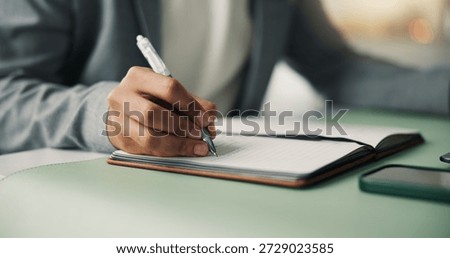 Creative, writing and hands with notebook, office and planning for ad campaign, project and schedule. Business, copywriter and person with journal for research, ideas and notes for article on desk