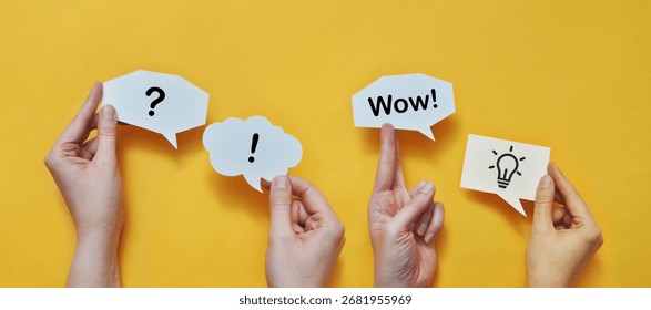 Creativity and brainstorming. Clouds with a question mark, an exclamation mark, the word "Wow!", and a light bulb as a symbol of creativity and ideas.