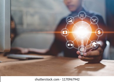 Creativity and innovative are keys to success.Concept of new idea and innovation with Brain and light bulbs. - Shutterstock ID 1170967942