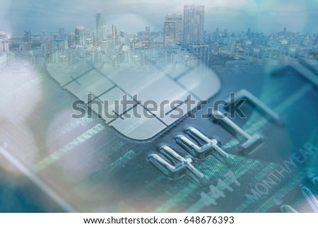 Credit card with city business background. Concept of finance credit banking.