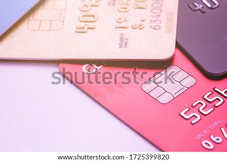 Credit card close up, Low key macro shot with old credit card. Stack of multicolored cards close-up.