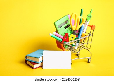 Credit Card, Empty Blank, Stationery, Shopping Basket On Yellow Background. Education, Back To School, Shopping.