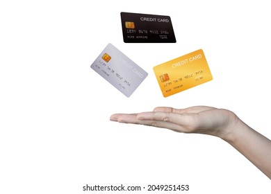 Credit card floating in the hand of a business woman on white background. - Powered by Shutterstock