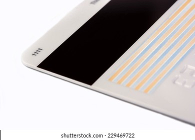 Credit Card With A Magnetic Stripe On A White Background