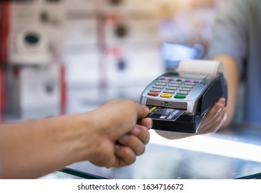 Credit card payment, credit card machine.