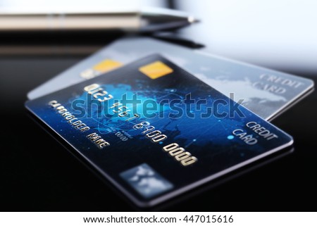 Credit cards with glasses, close up