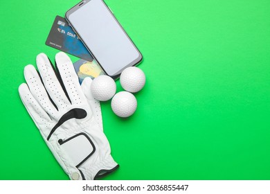 Credit Cards, Mobile Phone, Golf Glove And Balls On Color Background. Concept Of Sports Bet